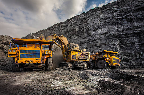istockphoto-499775926-612x612-1 Coal production at one of the open fields in the south of Siberia. Dumpers "BelAZ". September 2015.